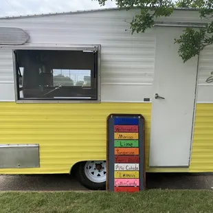 Now located beachfront, in the little yellow camper (Bay Ave.)