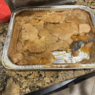 a pan of peach cobbler