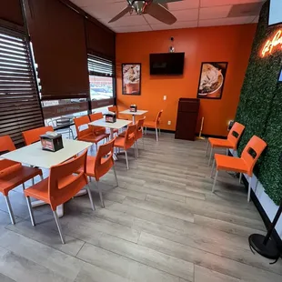  orange chairs and tables