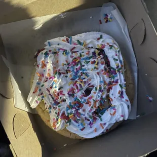 a frosted donut in a box
