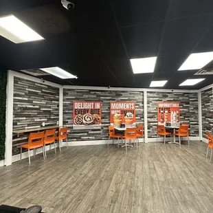 orange chairs and tables