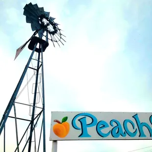 Peach Pit sign w/ windmill