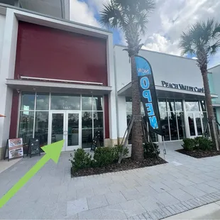 Enter through this door, not the address from the website which has the Peach Valley Cafe signage