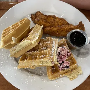 Chicken and waffles with blueberry butter and Cajun syrup