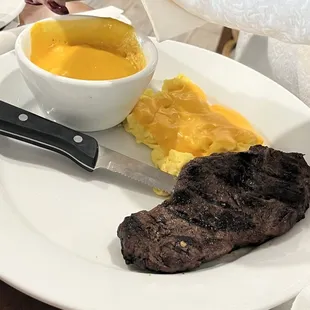 Medium well steak and eggs