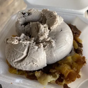 Peach cobbler with cookies and cream ice cream