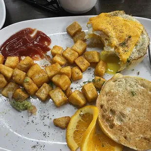 Egg sandwich and potatoes