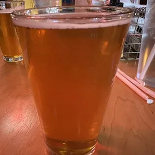 a glass of beer on a table