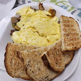 Sausage skillet. Cooked peppers and onions with crispy hasbrowns too!