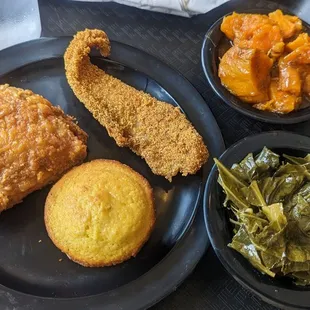 a plate of fried chicken, cornbreads, and greens