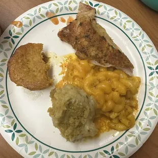 disgusting. Baked chicken, macaroni and cheese dressing, sweet potato muffin.