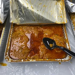 three pans of food