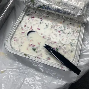 a bowl of soup with a spoon in it