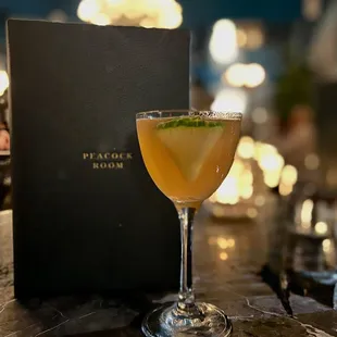 a cocktail in a coupe glass