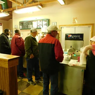 a group of people in a restaurant