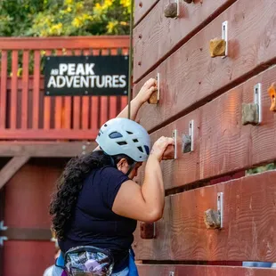 Climbing the Rock Wall at our Fall 2024 Open Climb.
