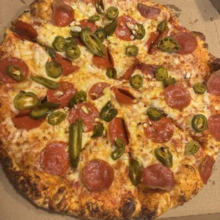 Pepperoni jalapeño pizza