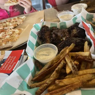 Blueberry bbq wings with fries and a 10" cheese pizza.