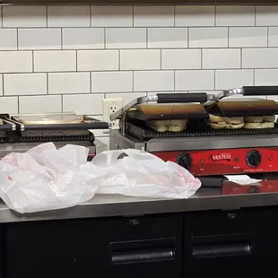 Sandwiches being grilled