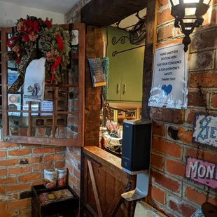 a brick wall with a sign on it