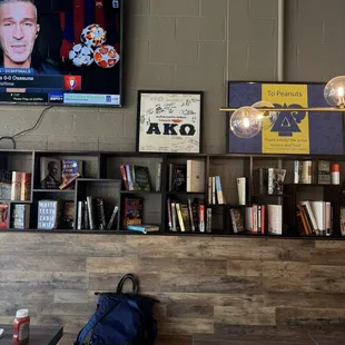a television and bookshelf