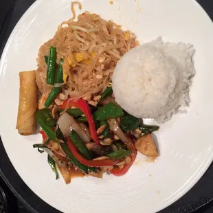 a plate of food with rice and vegetables