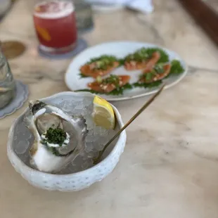 Oyster with caviar and salmon Crudo