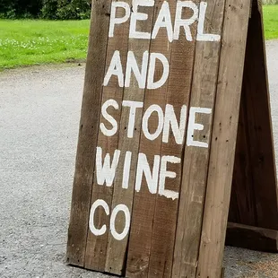 a sign for pearl and stone wine co