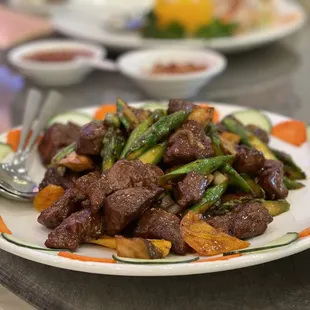 Tender Beef Cubes and mushrooms and asparagus at Pearl Bay Restaurant in the Pacific Commons Shopping Center in Fremont.