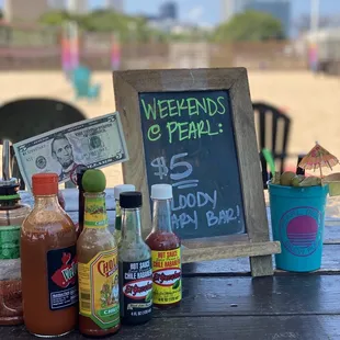 a chalkboard with a sign that says weekend&apos;s pearl