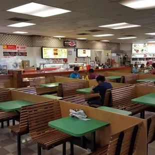 Small food court with 4 or 5 take out places.