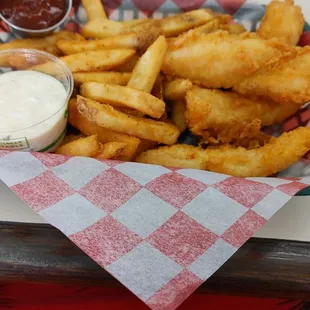 a basket of fries and ketchup