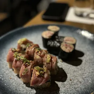 a plate of sushi on a table