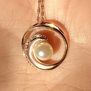 This is the pendant that I chose for my pearl at the Pearl Factory in the Polynesian Cultural Center.