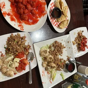 Sweet and Sour Pork Tray, pot stickers, pork fried rice, and walnut shrimp