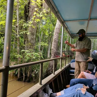 Our guide showing us some crawfish.