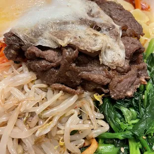 BI BIM BAP - Rice with vegetables, beef and fried egg all deliciously seasoned