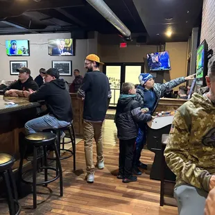 Inside of the bar looking at the entrance door and our server aka Blippi