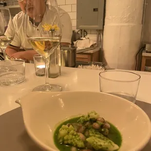 Bean and romanesco soup with parsley broth