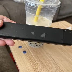 Pieces of plastic gound in drink