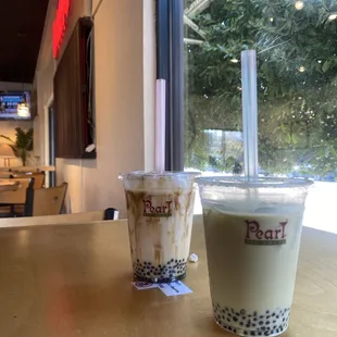 brown sugar with baby boba and green tea milk tea with baby boba