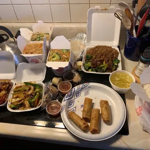 Veggie lo mein, my shu shrimp w/pancakes , happy family w/ veggies on the side, beef broccoli, steamed rice, chicken lo mein, egg roll