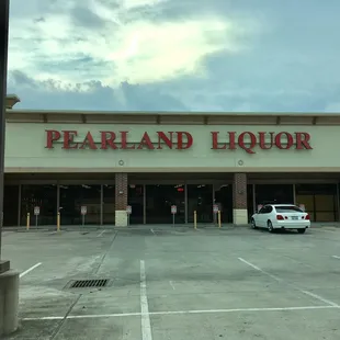 a car parked in front of the store