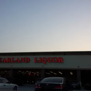 cars parked in front of the store