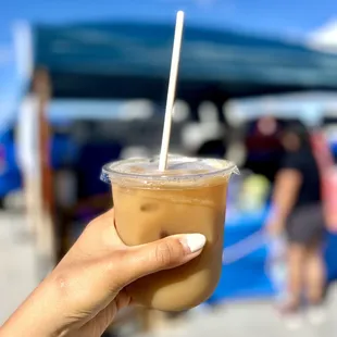 Honey Lilikoi Coffee with Almond Milk from Rise and Grind