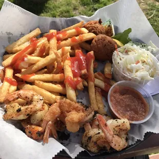 Grilled shrimp dinner, mixed with a few fried shrimp from another order.
