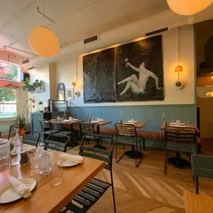 a dining room with tables and chairs