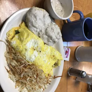 Hot and Spicy omelette. Gravy and hash browns were a add on