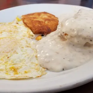 Sausage cornbread and gravy with eggs and potato pancake. Pretty good!