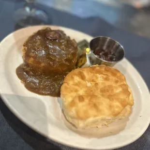 Cheddar grits with andouille sausage gravy